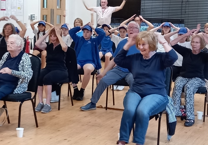 Leeds Jewish Welfare Board | What’s on People seated doing exercises
